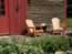 Muskoka chair in front of the Coach house